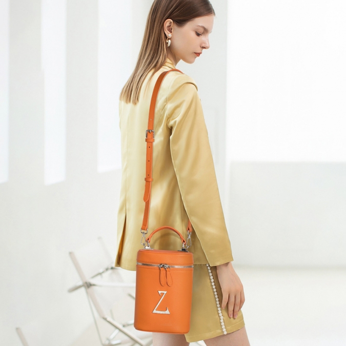 Saco balde de couro genuíno de cor laranja 2021 para senhoras com logotipo personalizado 